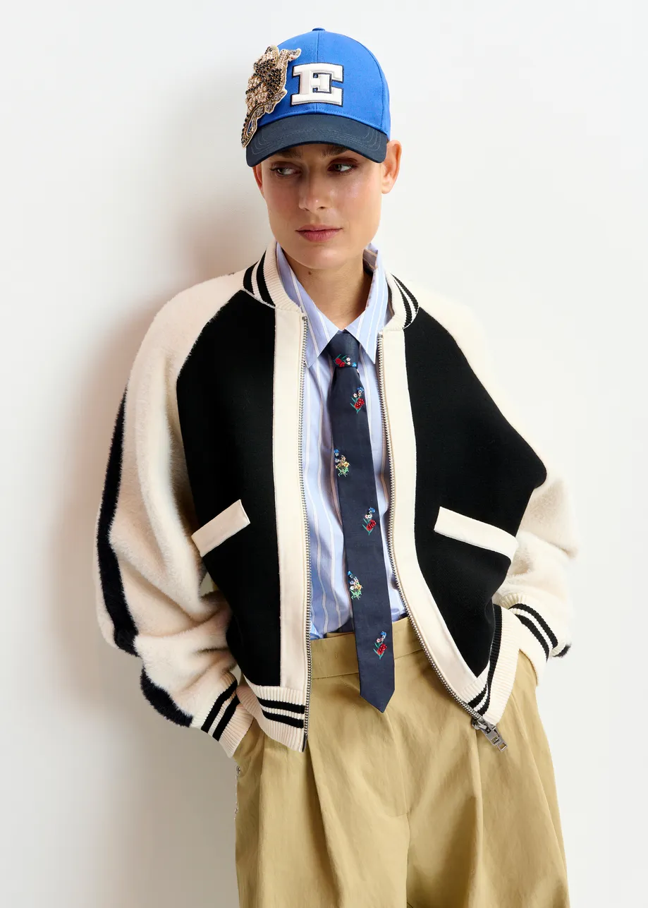 Black and white faux fur-panelled knitted bomber jacket