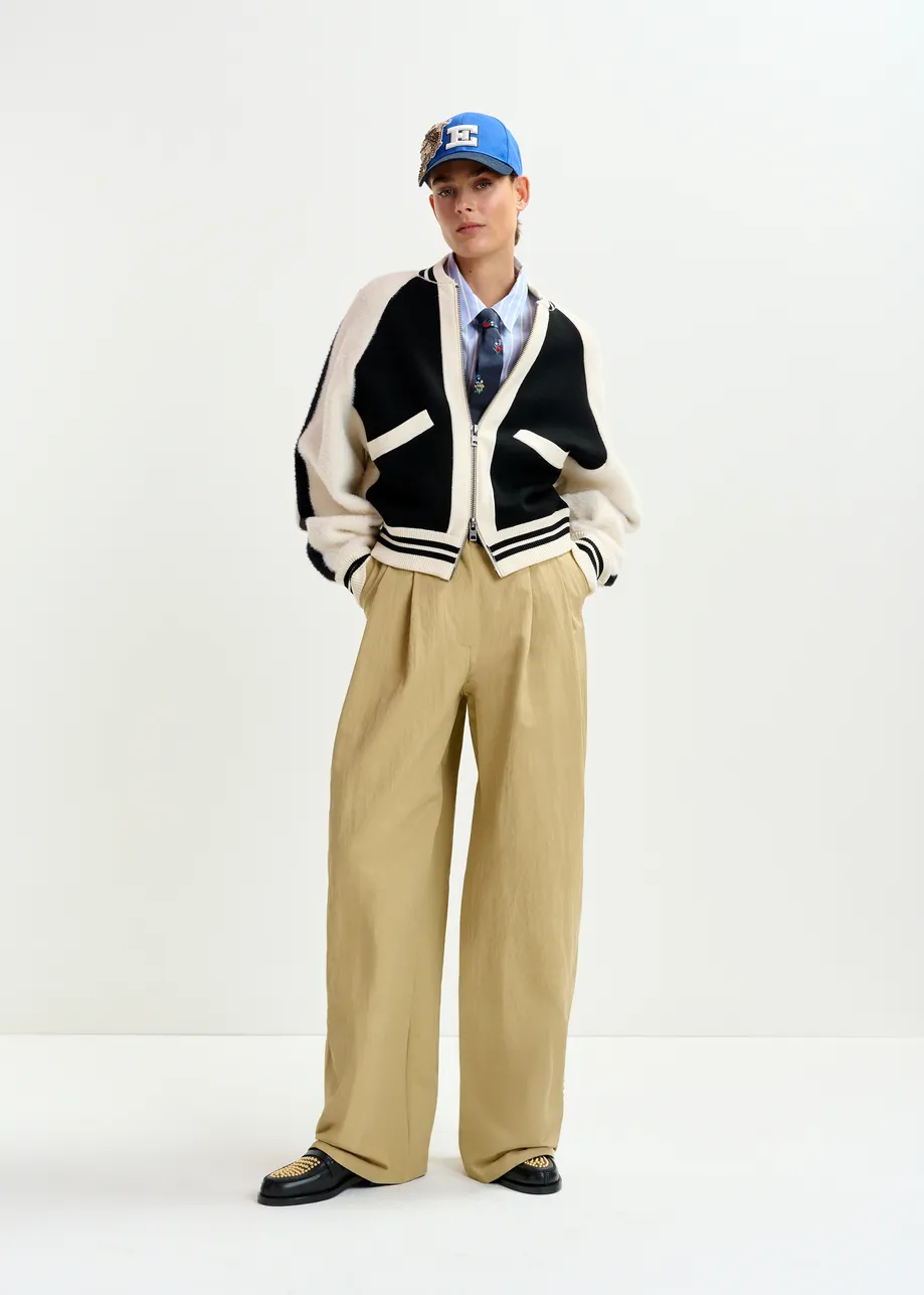 Black and white faux fur-panelled knitted bomber jacket