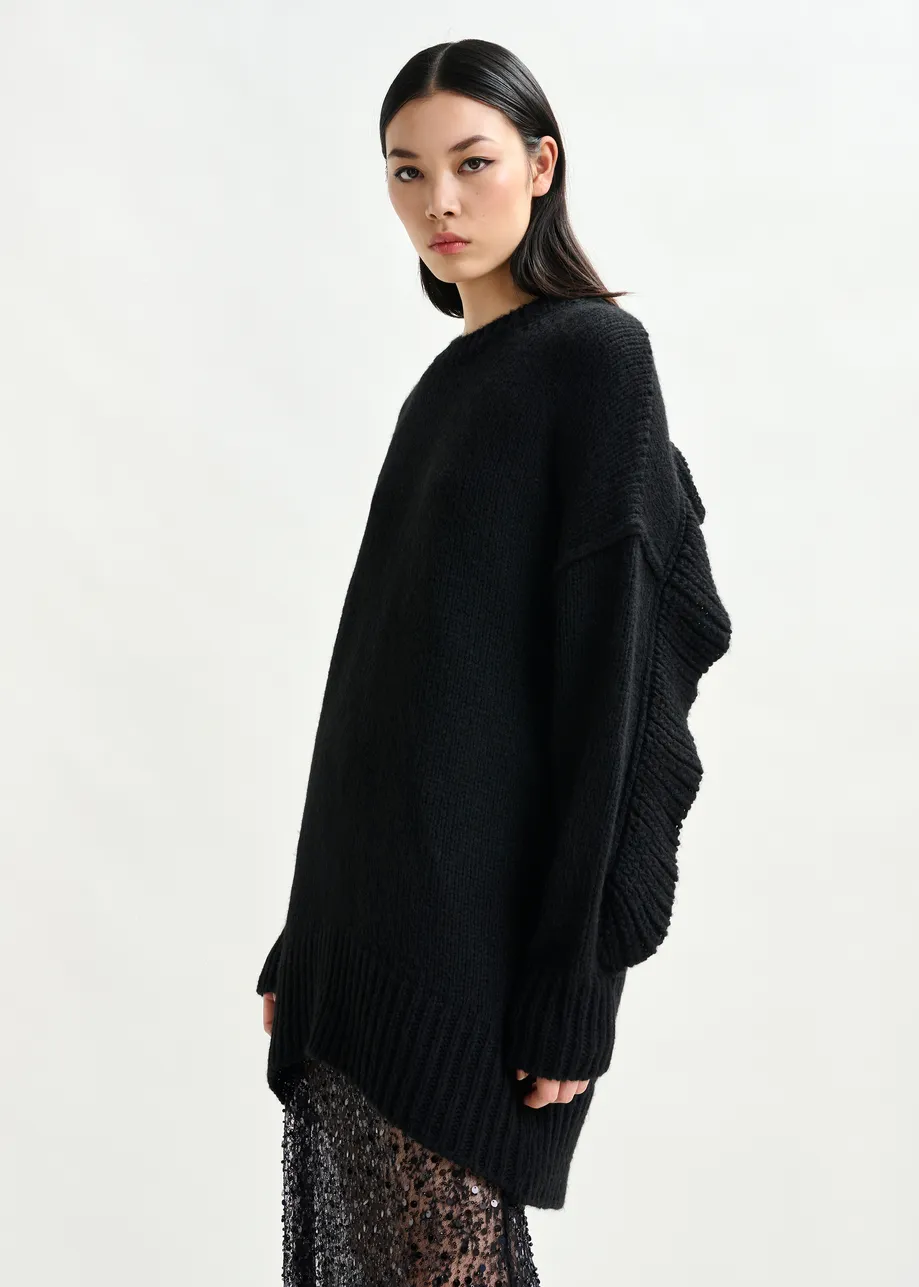 Black knit mini dress with ruffle detail