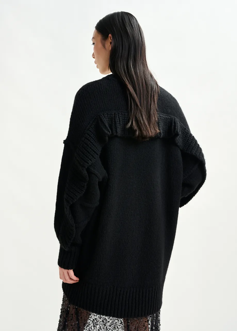 Black knit mini dress with ruffle detail