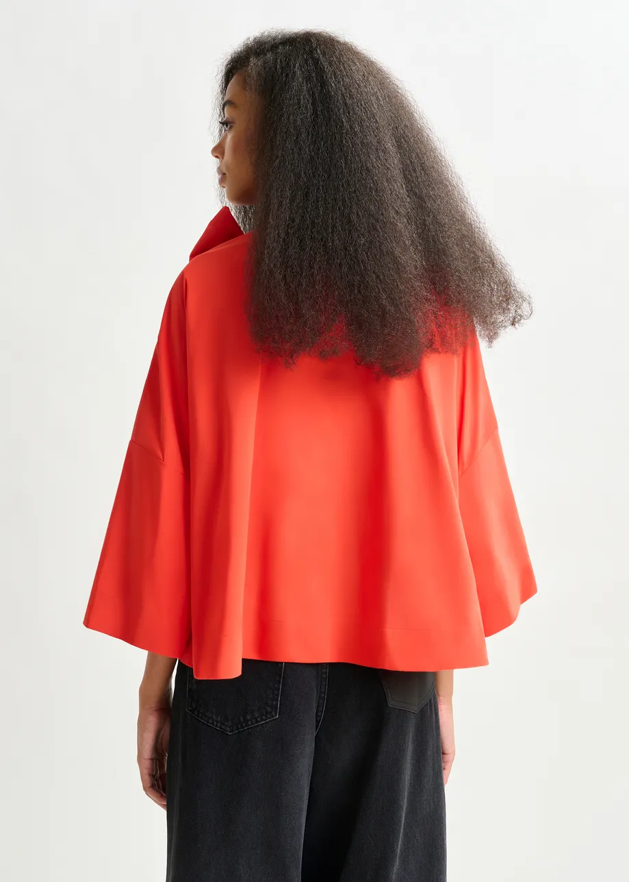 Red pussy-bow top with trumpet sleeves
