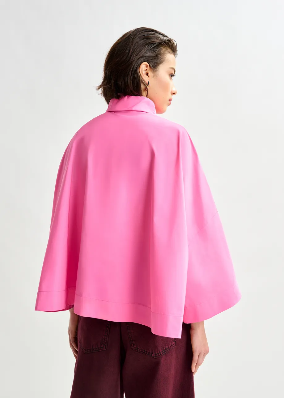 Pink pussy-bow top with trumpet sleeves