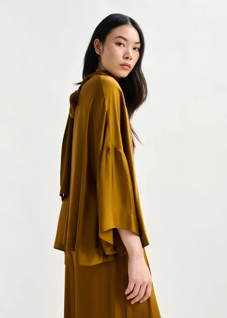 Green oversized top with pussy bow
