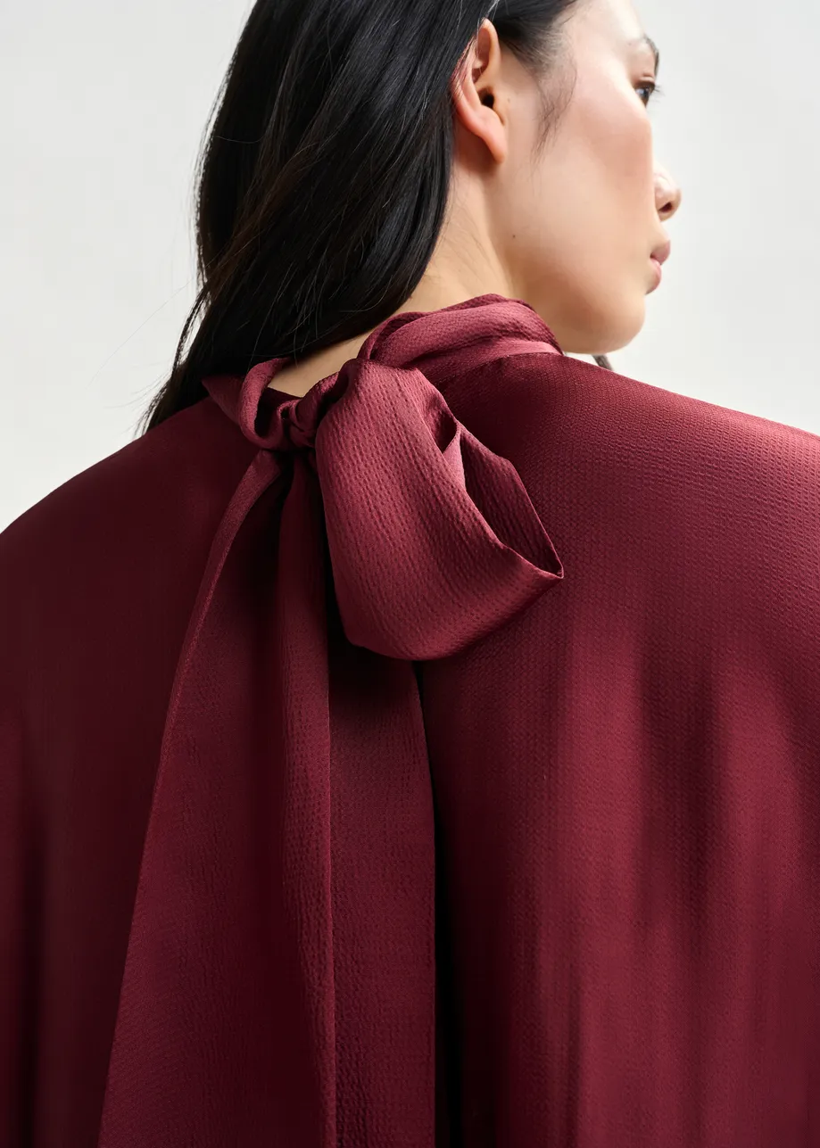 Burgundy oversized top with pussy bow