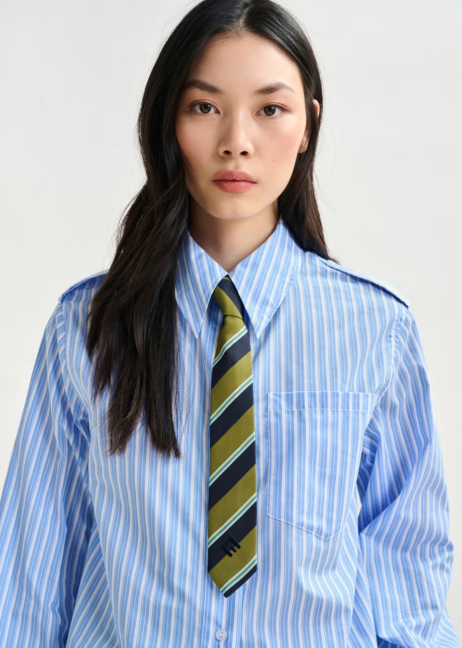 Green, dark blue and light blue striped tie with 'E' logo