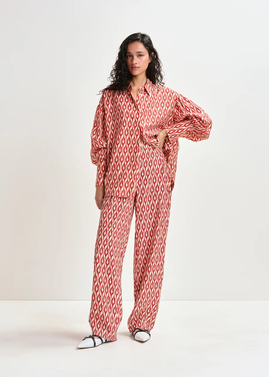 Oranje en beige broek met barrel-pijp en print