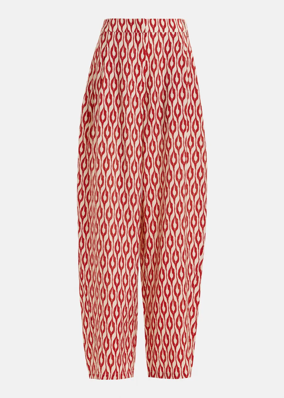 Oranje en beige broek met barrel-pijp en print