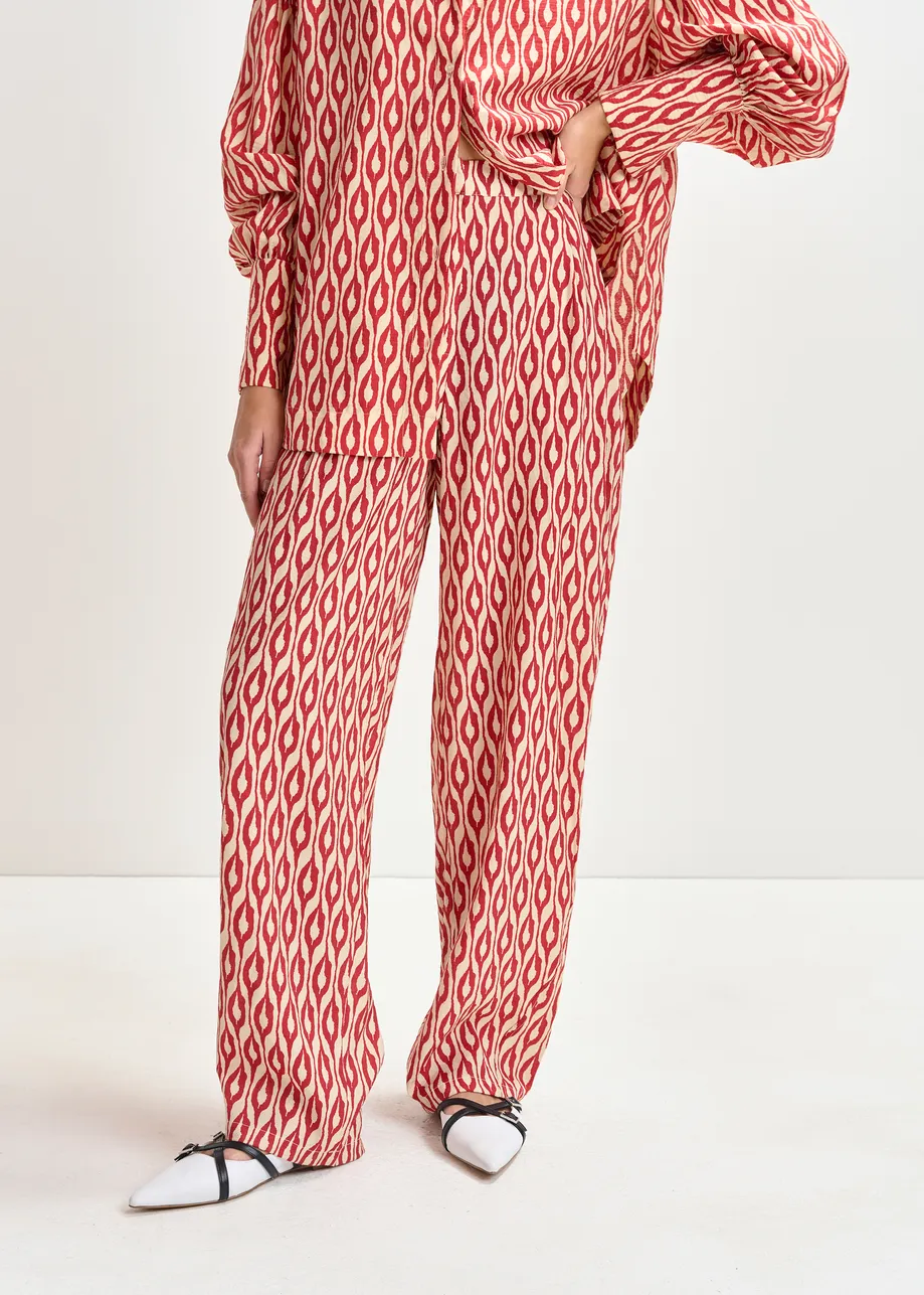 Orange and beige barrel-leg printed pants