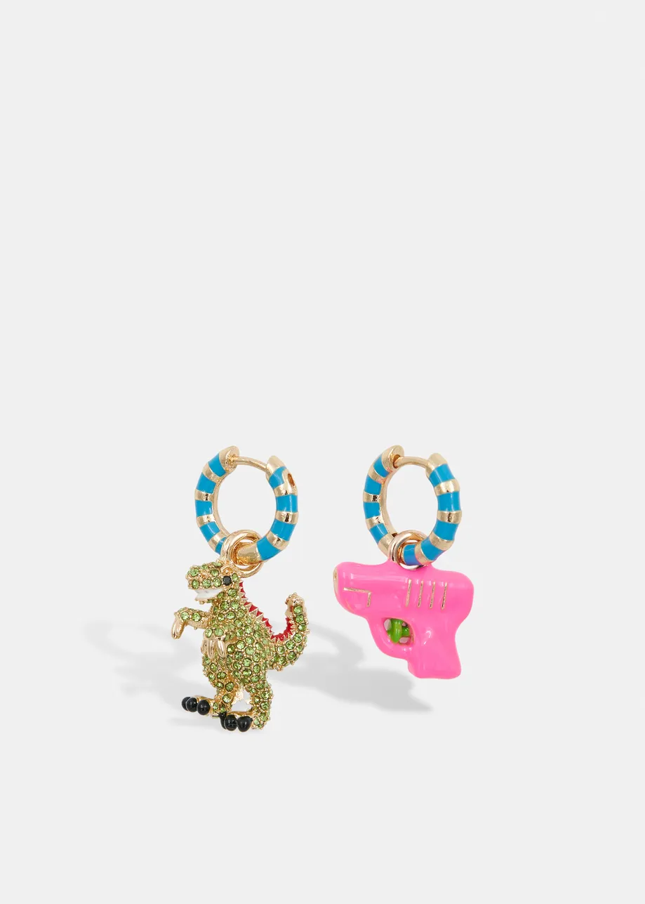 Gold and blue hoop earrings with dino and water gun pendants