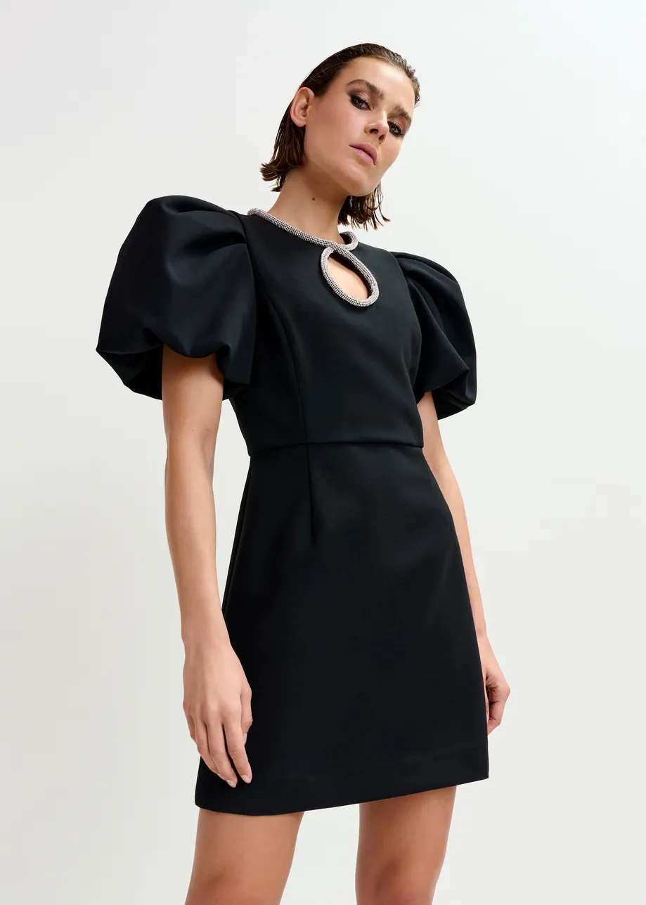 Black mini dress with puff sleeves and rhinestone-embellished keyhole neckline