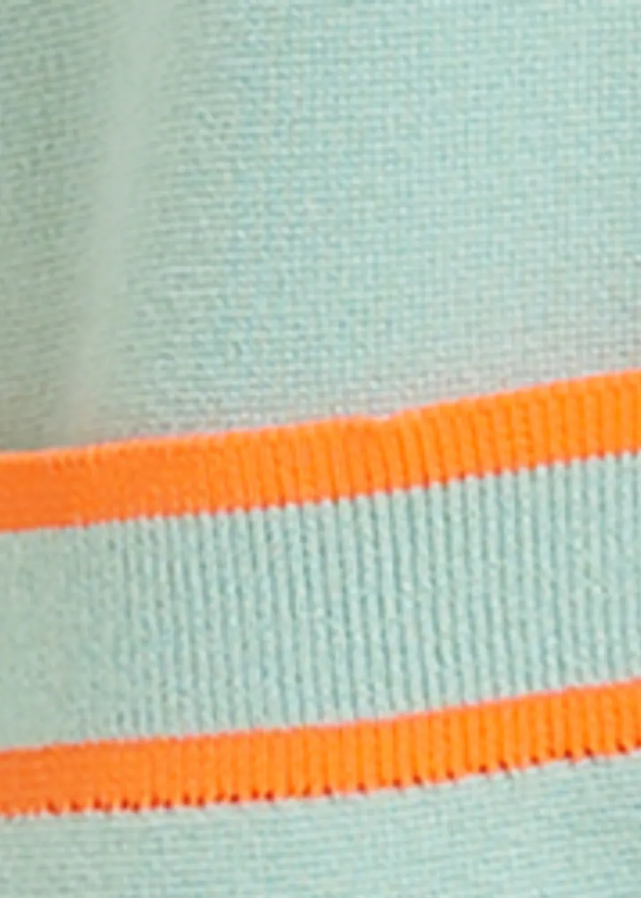 Cardigan bleu clair et orange à boutons en fleur et bord contrasté