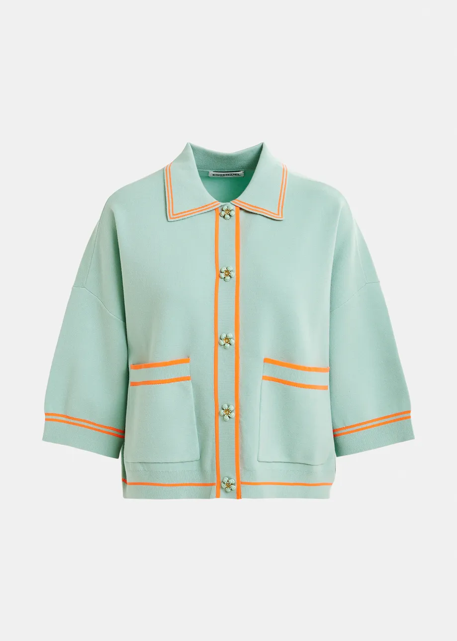 Light blue and orange knit cardigan with flower buttons and contrasting trims