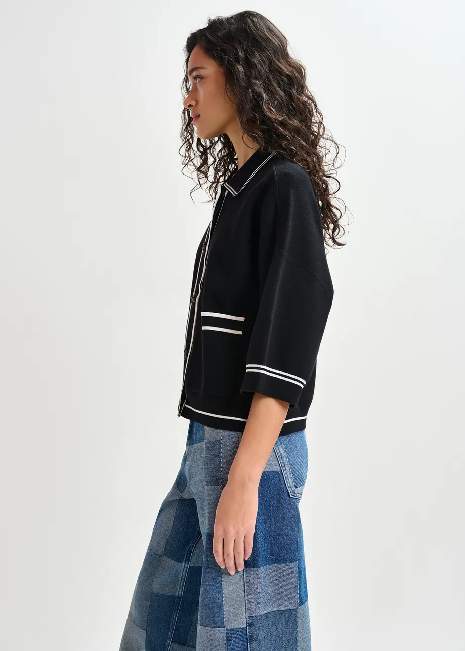 Black and white knit cardigan with flower buttons and contrasting trims
