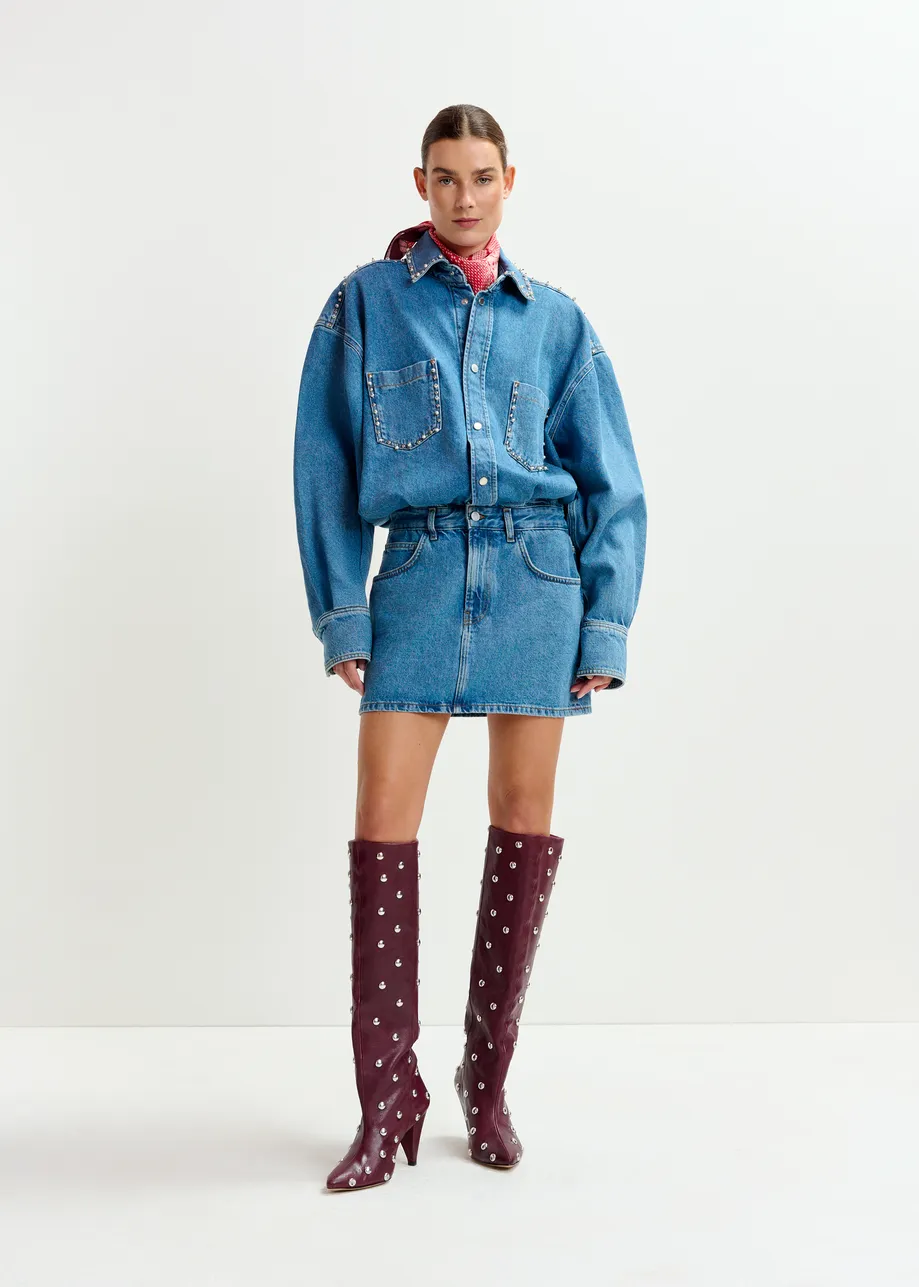 Blue two-piece denim set with pearl and stud embellishments