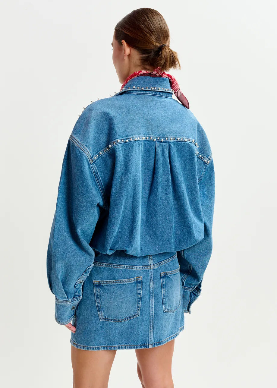 Blue two-piece denim set with pearl and stud embellishments