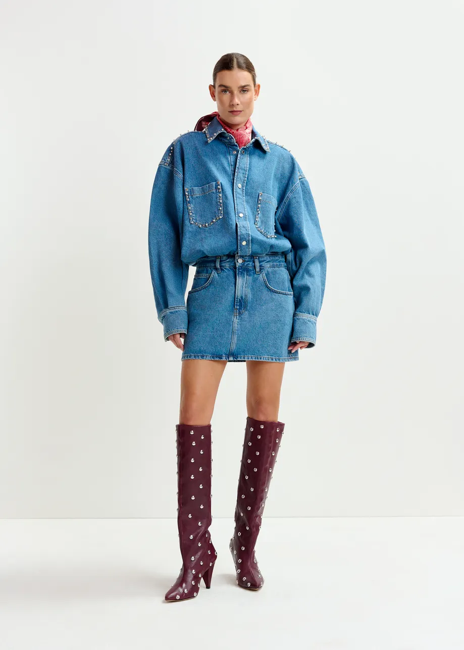 Blue two-piece denim set with pearl and stud embellishments