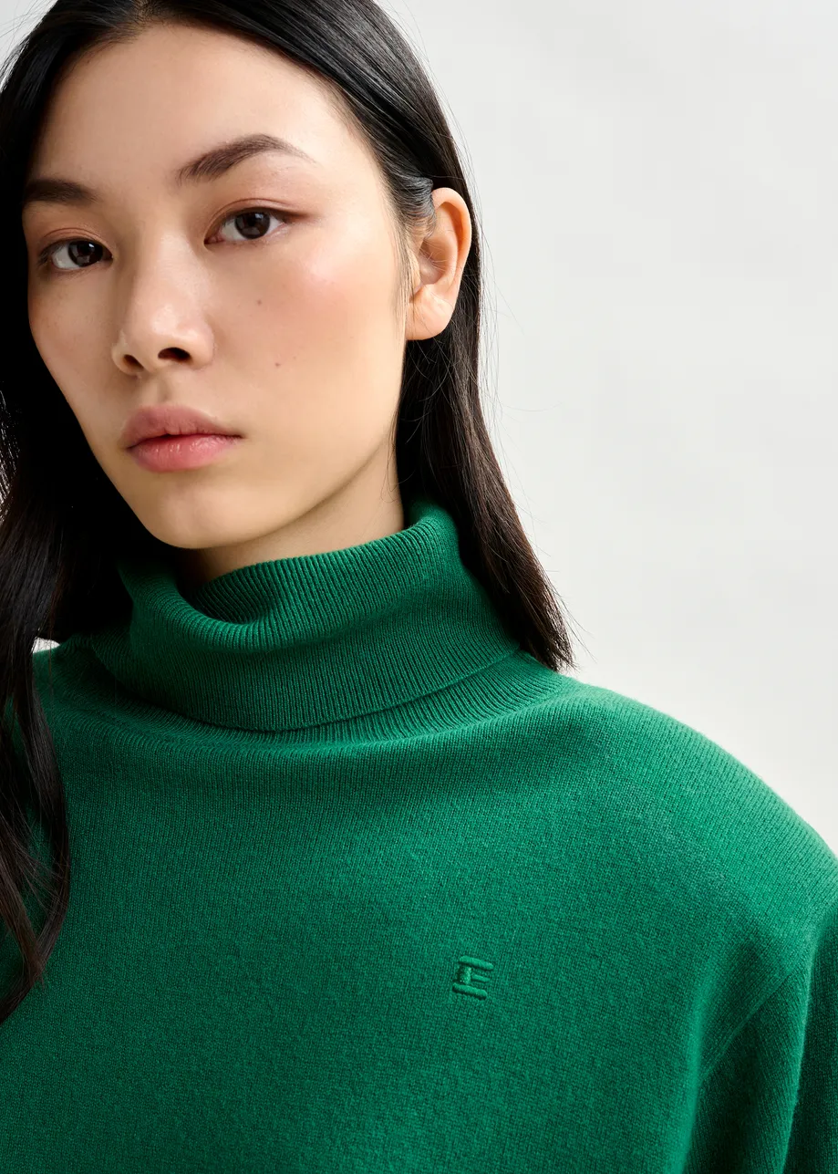 Green wool-blend turtleneck sweater with removable shoulder pads