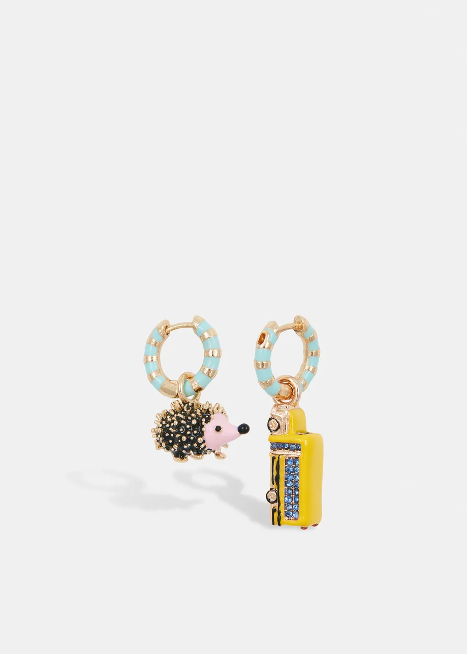 Gold and light blue hoop earrings with bug and robot head pendants