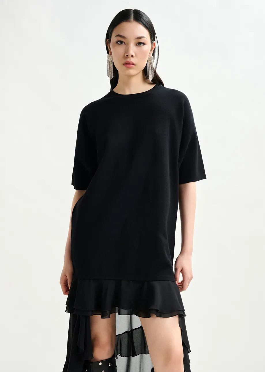 Black knitted dress with sheer layered hemline