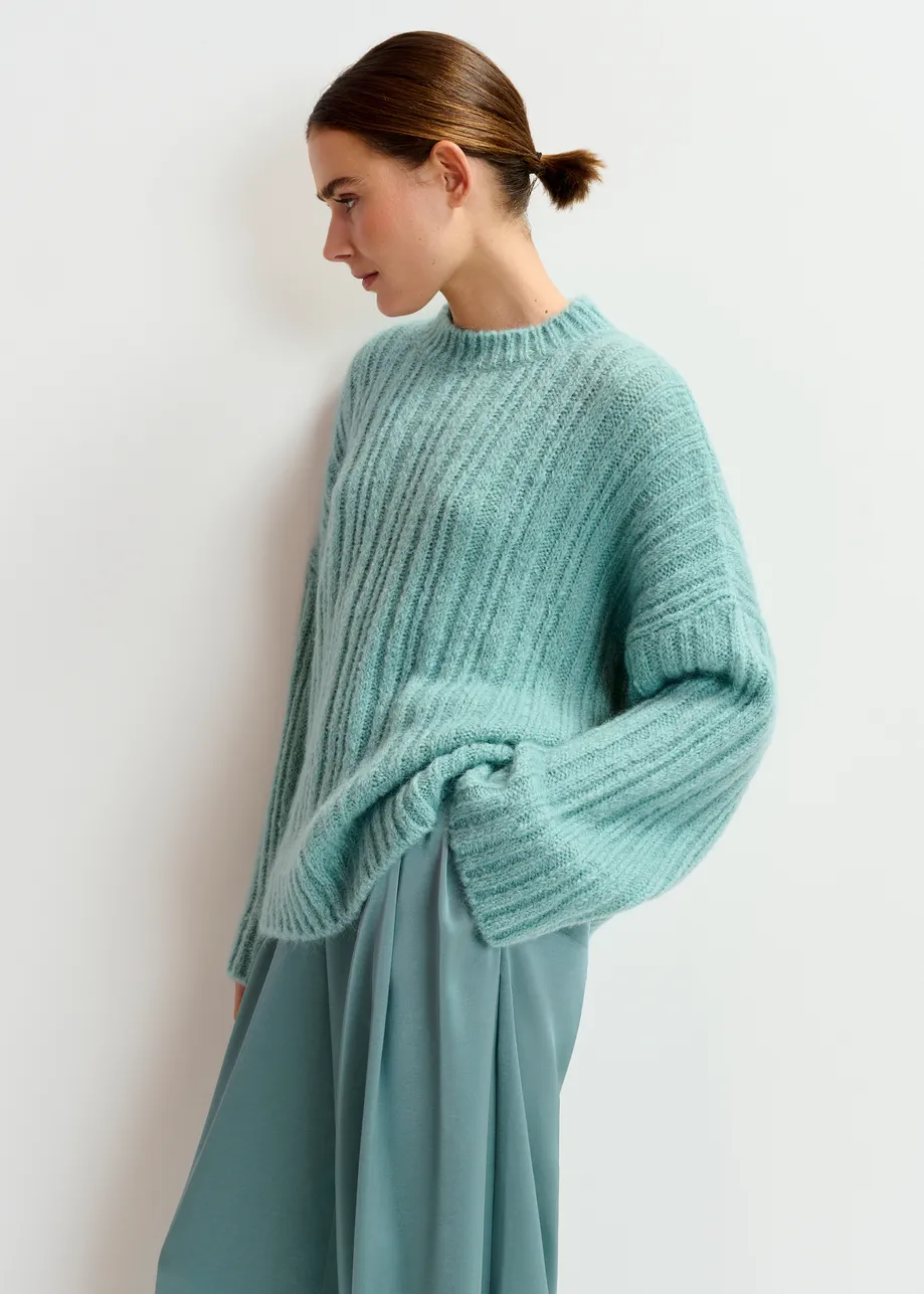 Light blue mohair-blend ribbed sweater with pussy-bow tie