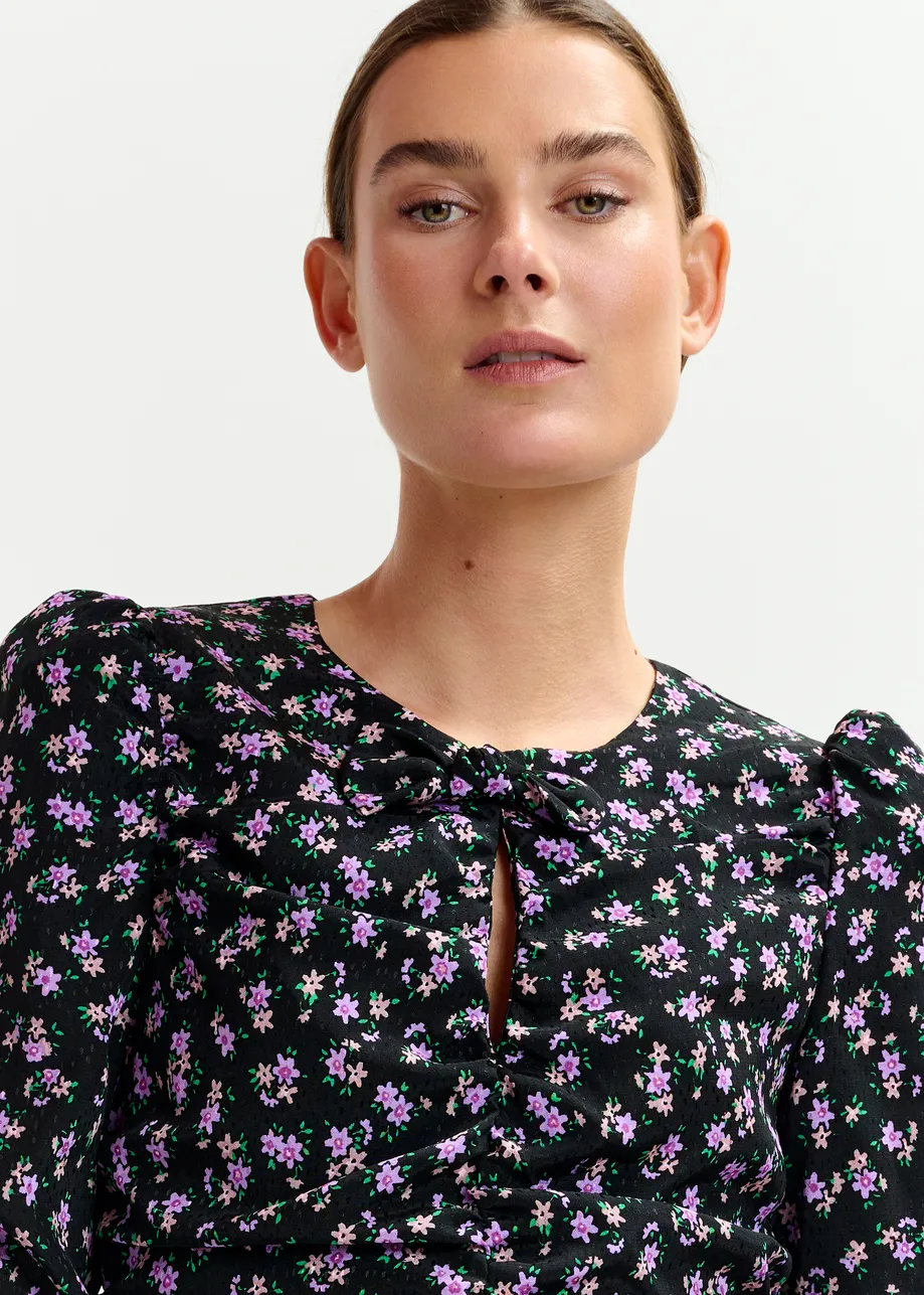 Mini-robe à ruches et imprimé noire, violette et verte