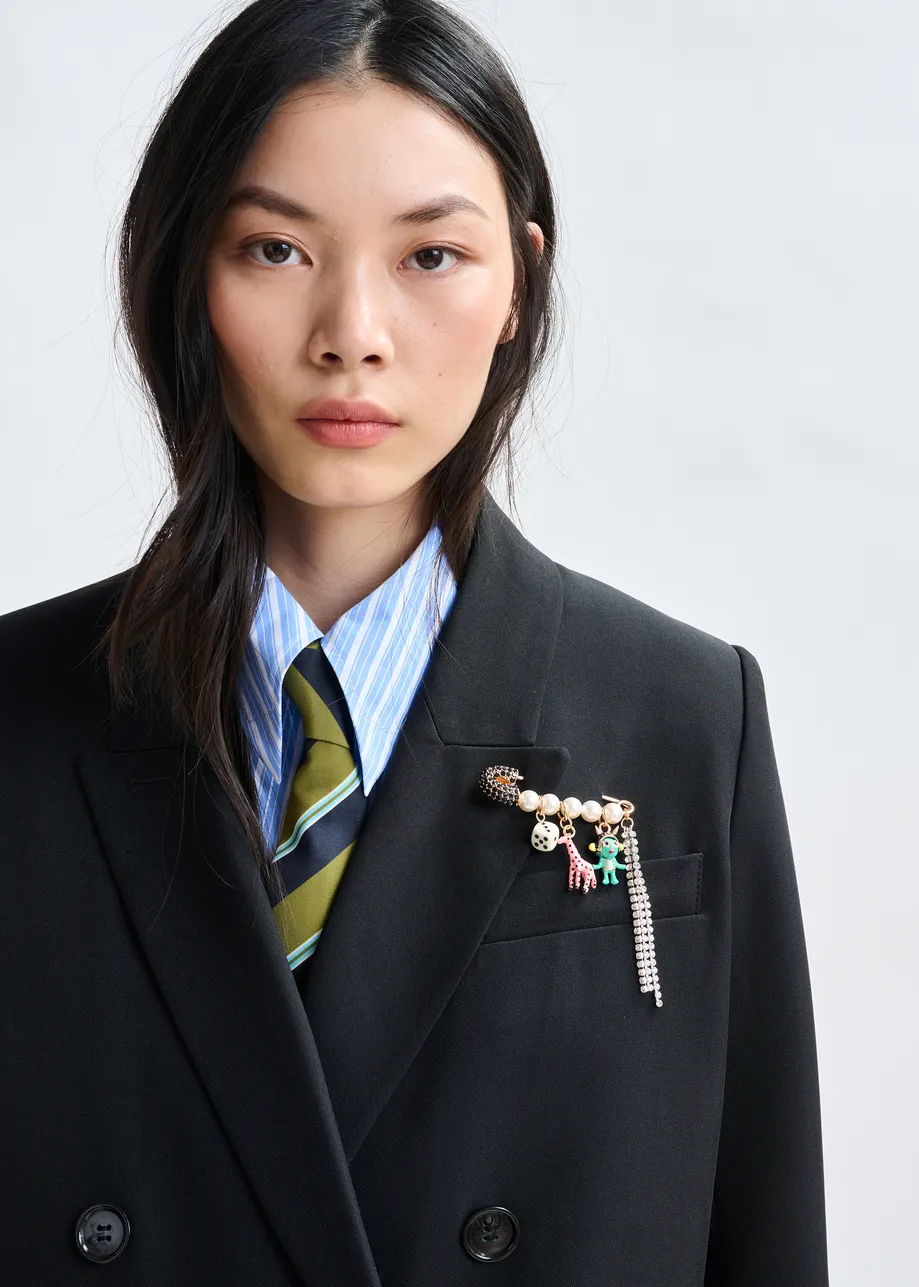Gold, off-white and black rhinestone encrushed safety pin brooch with pearls and charms