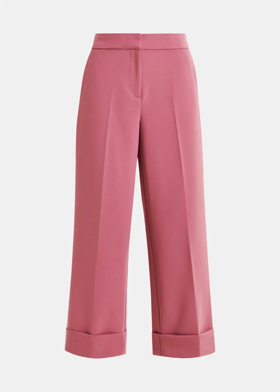 Vintage pink cropped pants with folded cuffs