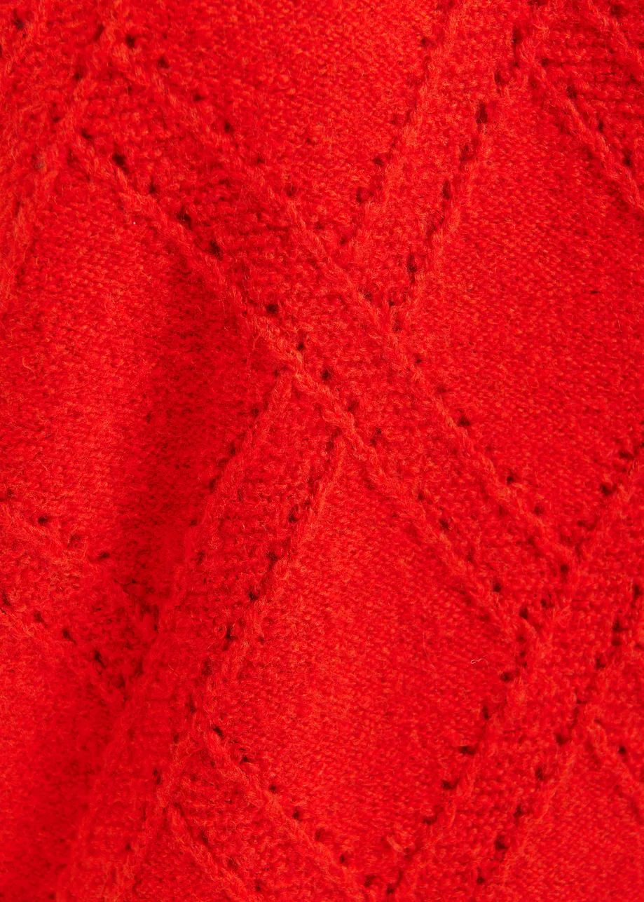 Red cable-knit sleeveless wool-blend sweater