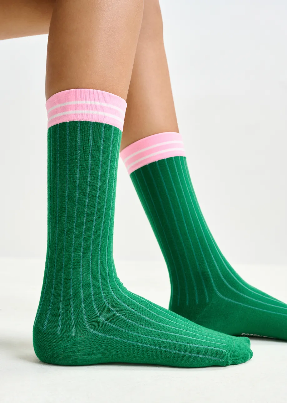Dark green, pink and white rib-knitted socks with stripes