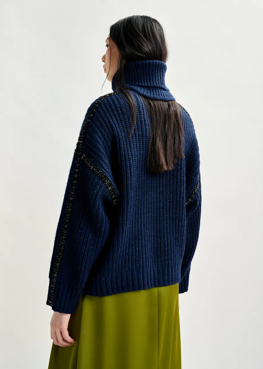 Navy wool-blend turtleneck with detachable collar and rhinestone embellishments