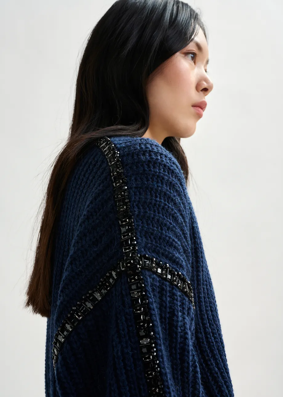 Navy wool-blend turtleneck with detachable collar and rhinestone embellishments