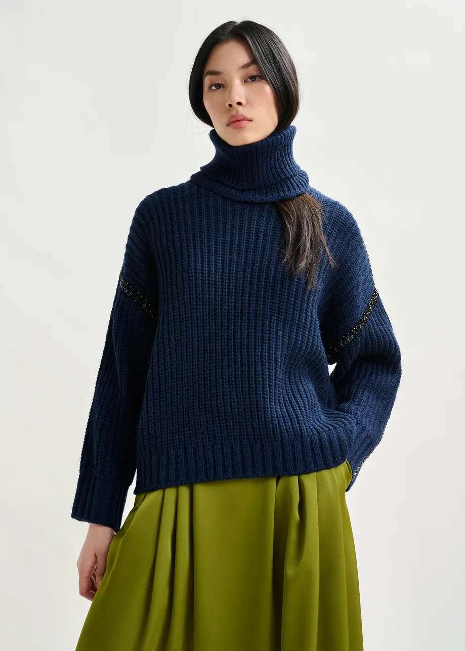 Navy wool-blend turtleneck with detachable collar and rhinestone embellishments