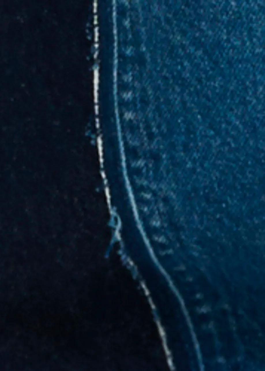 Blauwe en donkerblauwe wijde jeans met contraststukken
