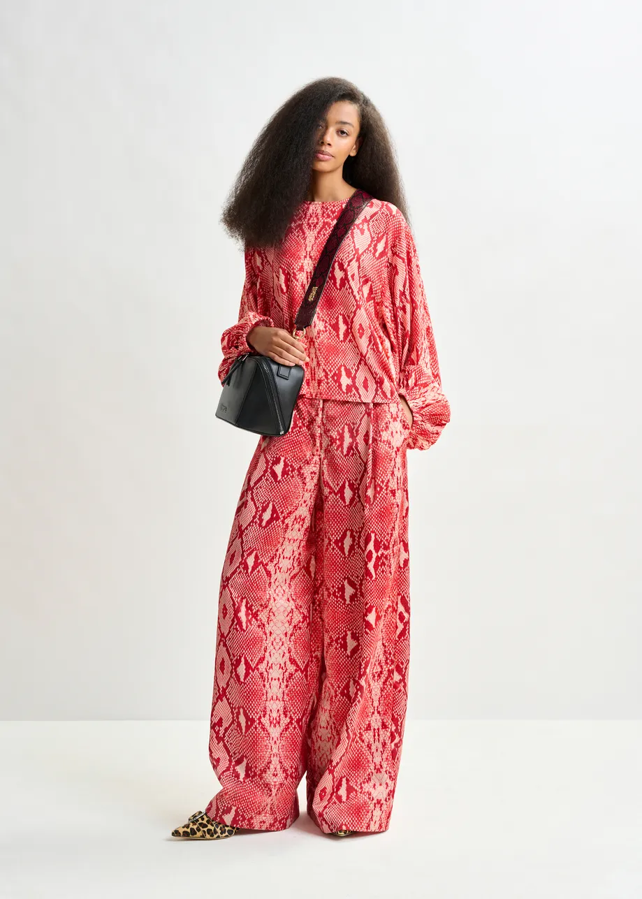Red and orange top with puffed sleeves