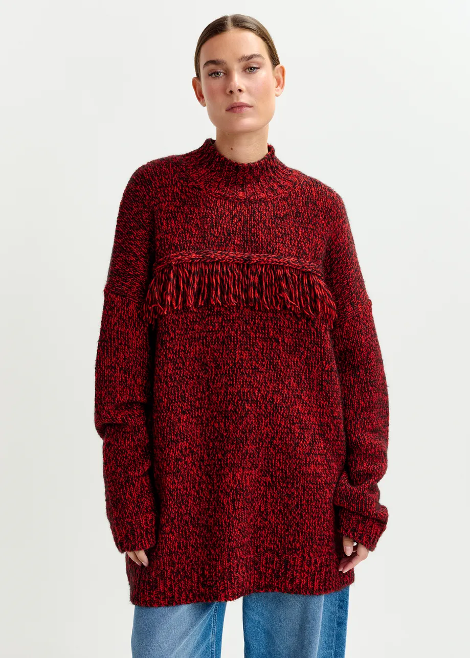 Dark red and black wool-blend sweater with fringe details