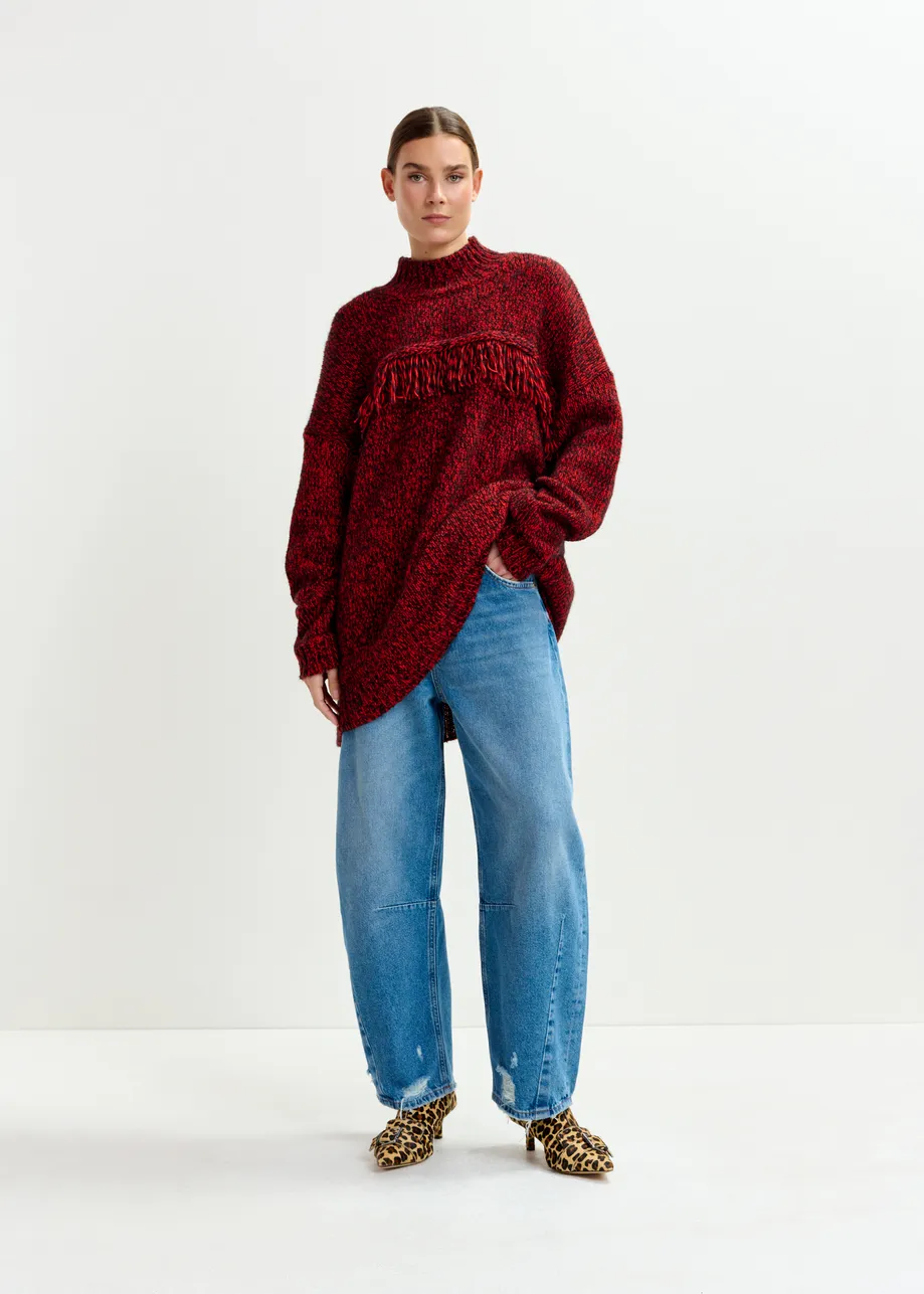 Dark red and black wool-blend sweater with fringe details