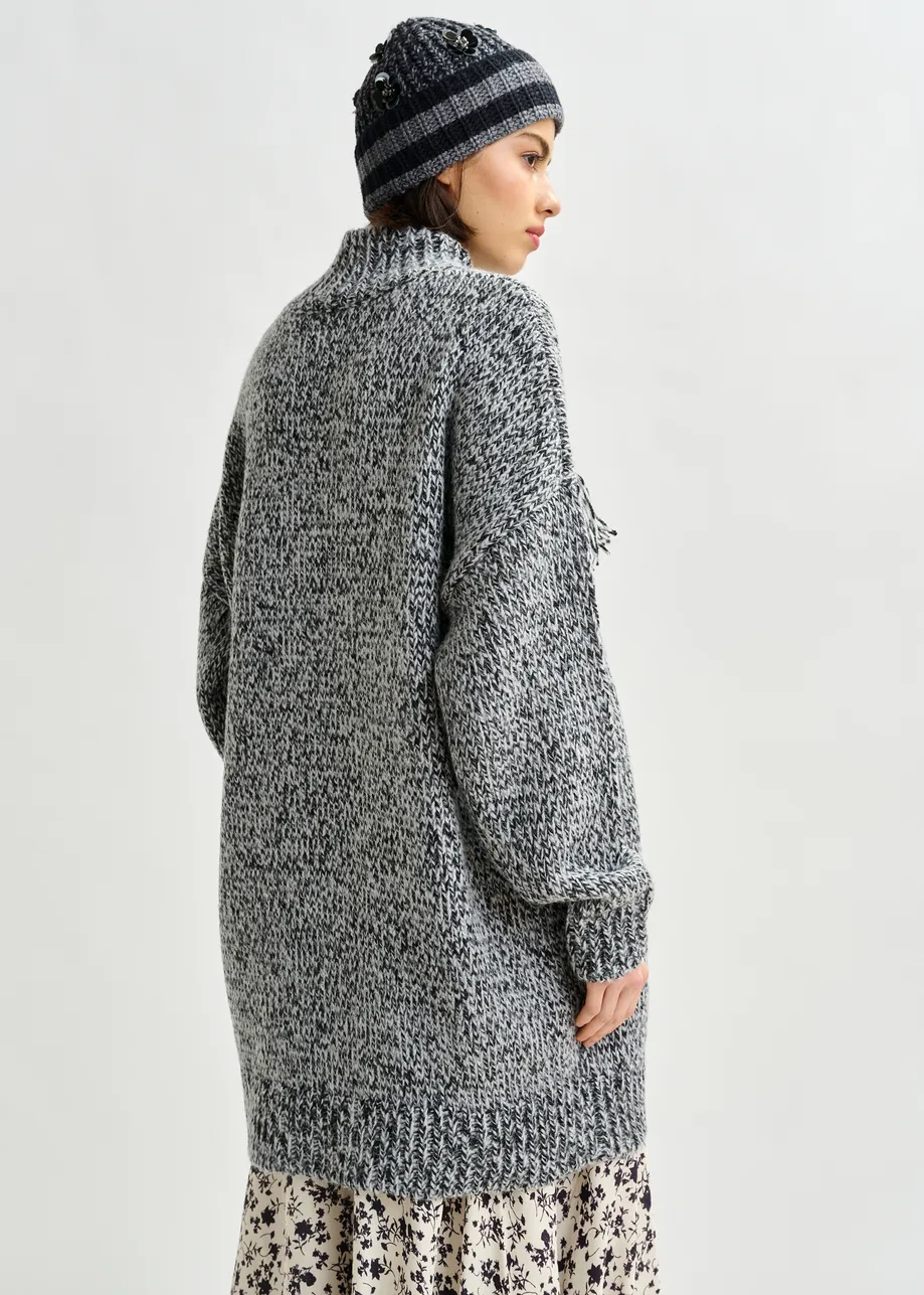 Grey and black wool-blend sweater with fringe details