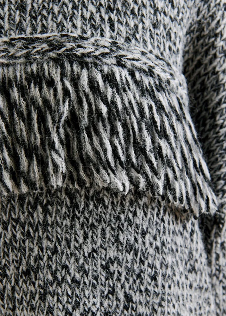 Grey and black wool-blend sweater with fringe details