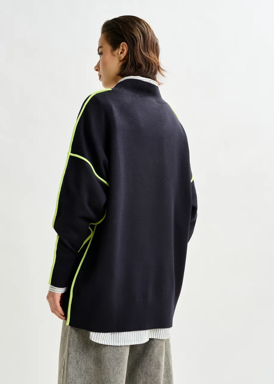 Navy and green oversized V-neck knit sweater with contrast stripe