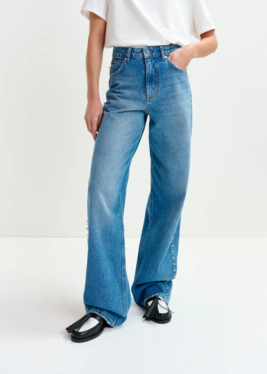 Blue straight leg jeans with pearl and stud embellishments