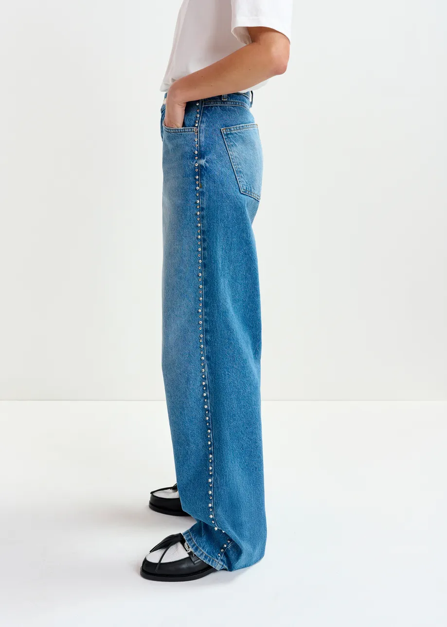 Blue straight leg jeans with pearl and stud embellishments