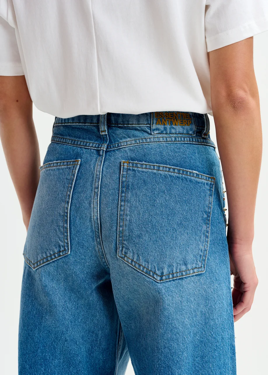 Blue straight leg jeans with pearl and stud embellishments