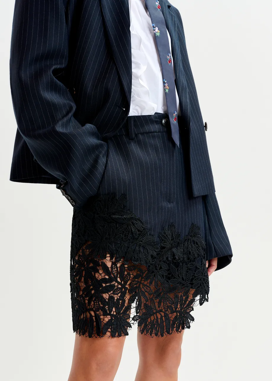 Navy, white and black pinstripe asymmetric skirt with lace appliqué