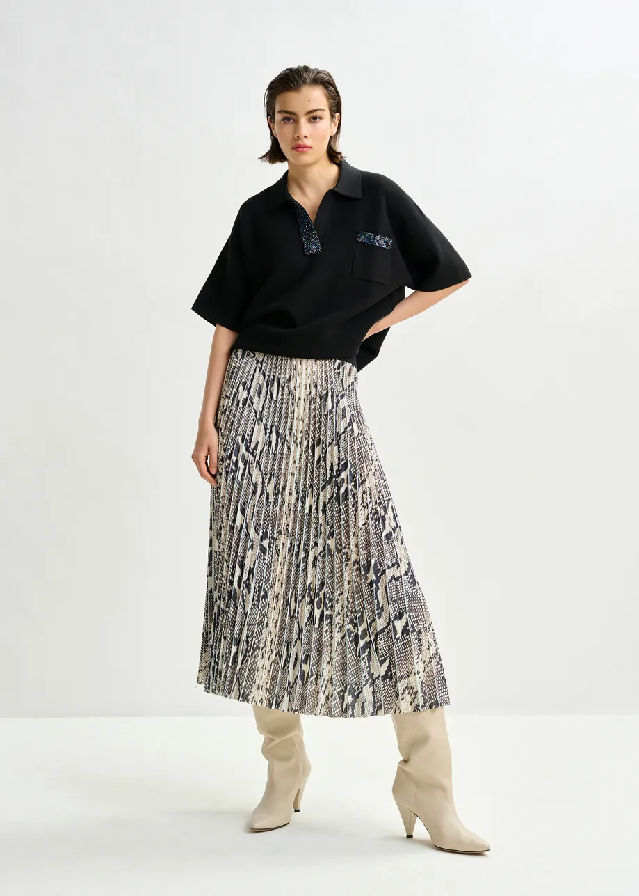 Zwart en blauwe polo met sierkraag