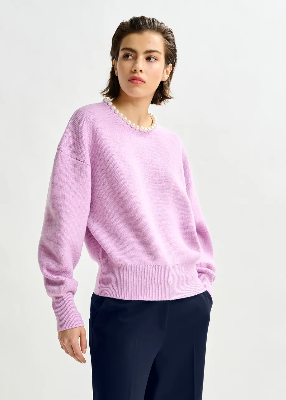 Light pink pearl-embellished knit sweater