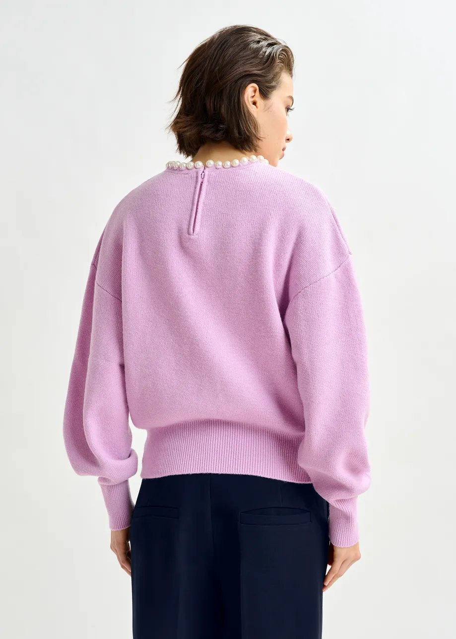 Light pink pearl-embellished knit sweater