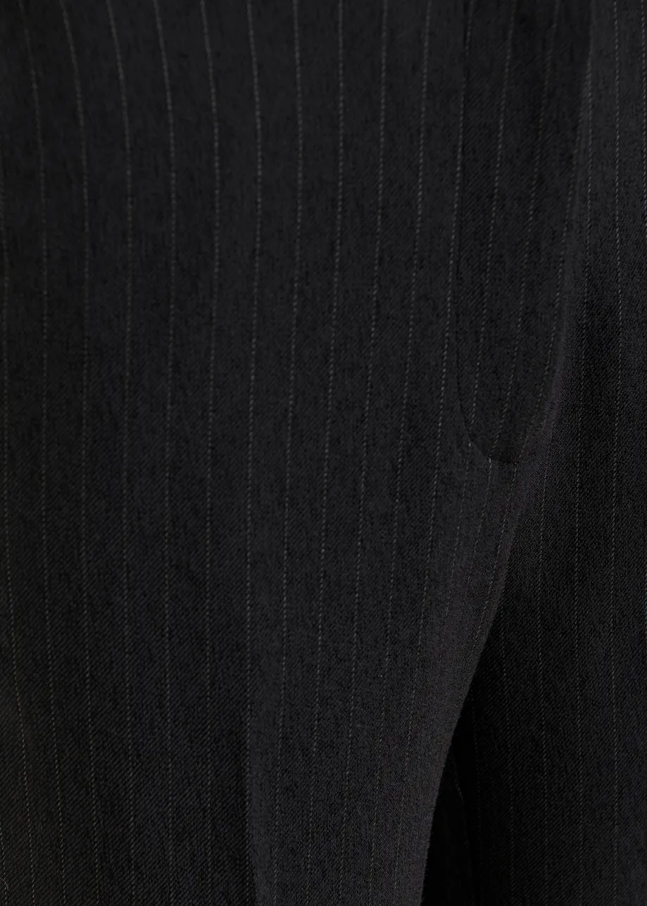 Navy and white pinstripe flared pants