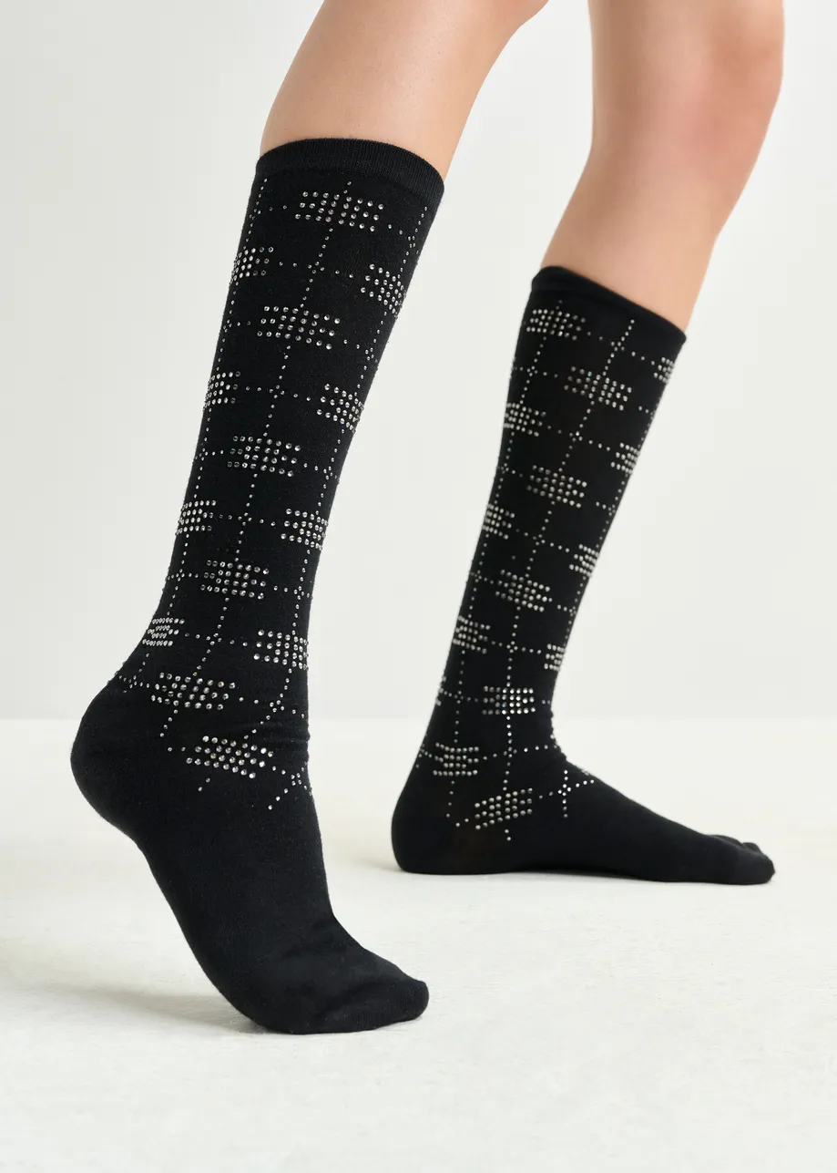 Black socks with rhinestone-embellished bow details