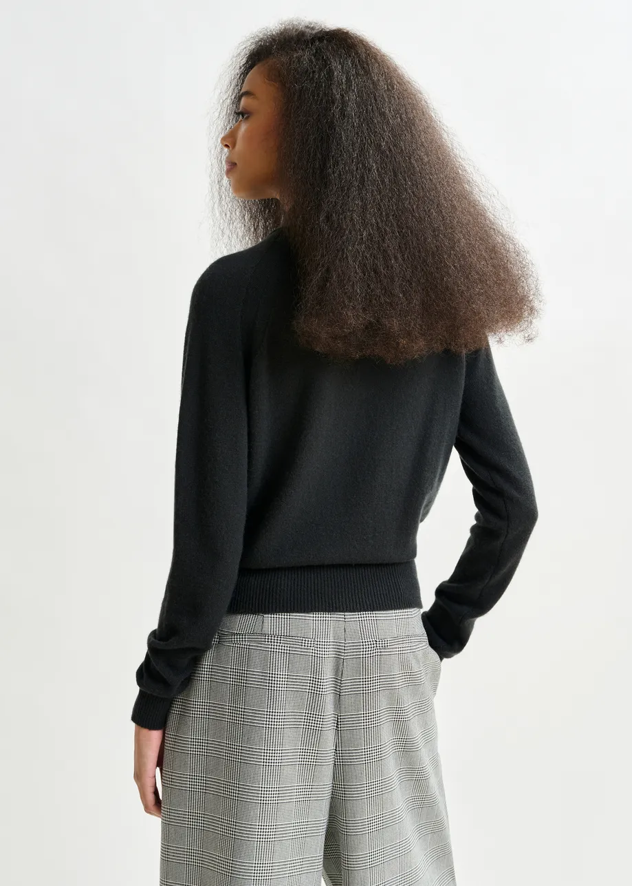 Black cashmere sweater with pussy-bow tie