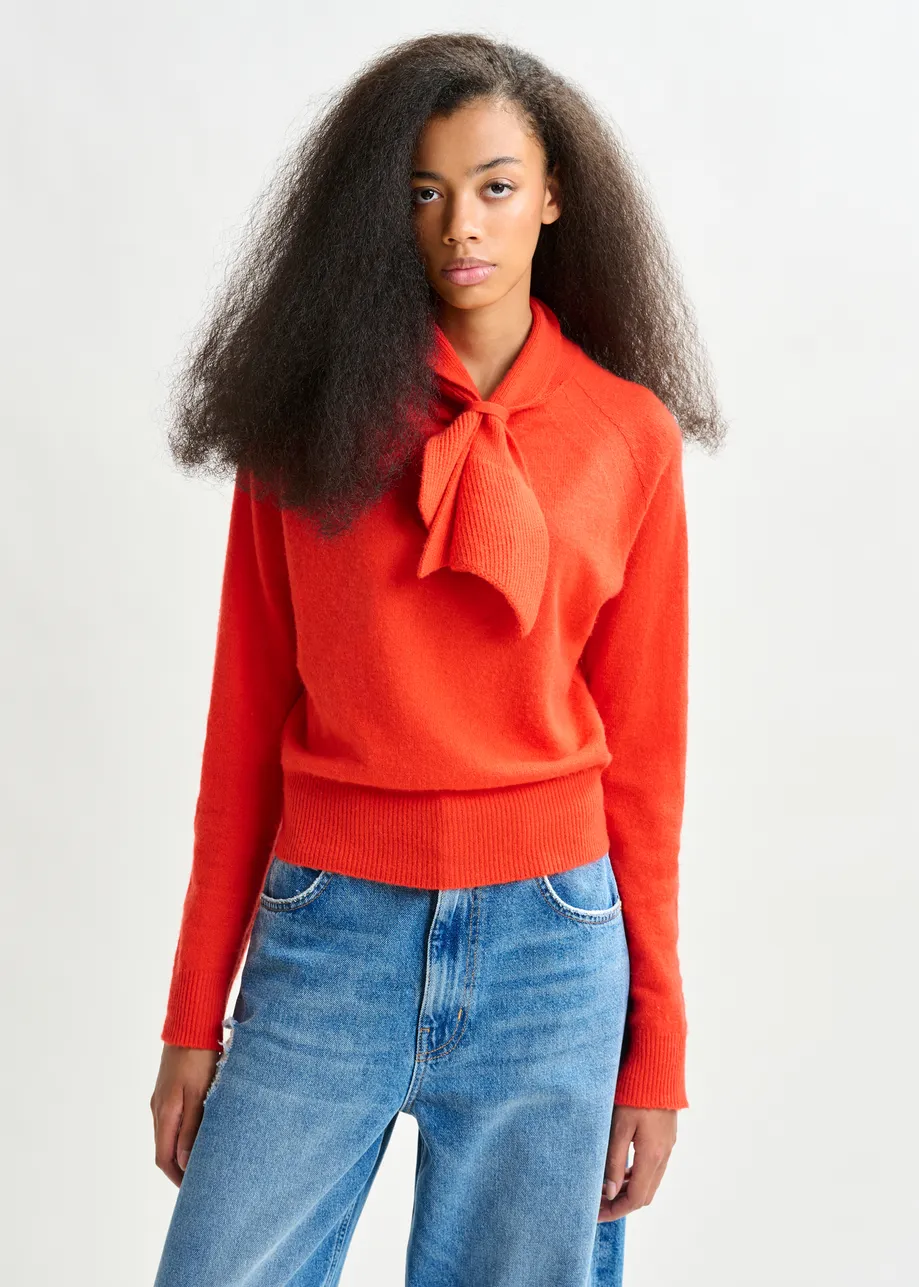Orange cashmere sweater with pussy-bow tie